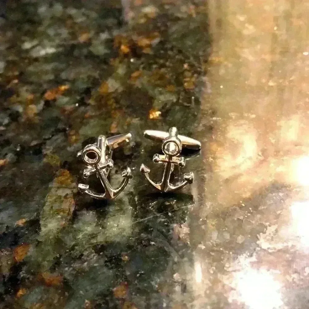 Cuff link set anchors